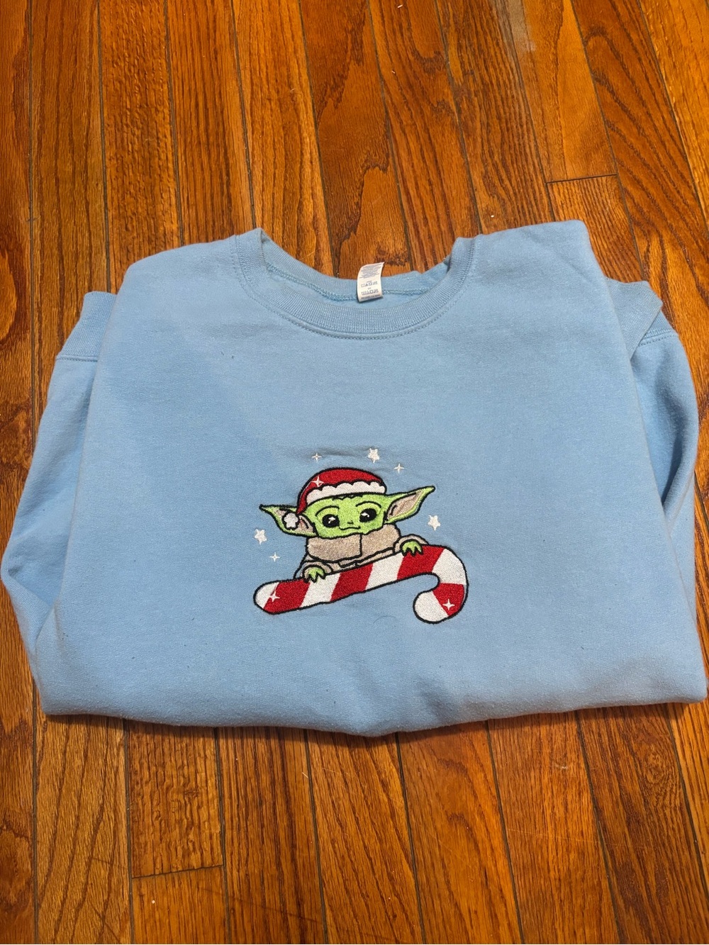 Light Blue Holiday Sweatshirt with Embroidered Baby Yoda and Candy Cane